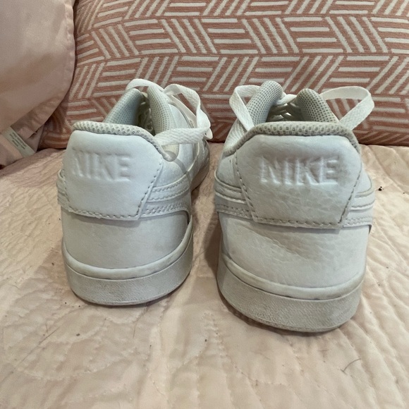 White, gently used Nike Air Force 1 tennis shoe. - Picture 4 of 6